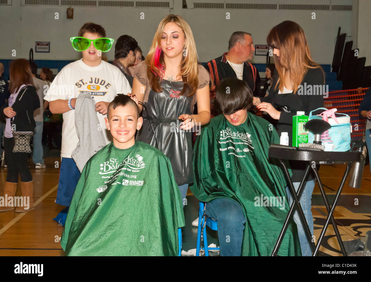 MARCH 15 2011 - MERRICK NY: St. Baldrick's Day at Calhoun High School, boys getting hair shaved off for childhood cancer charity Stock Photo