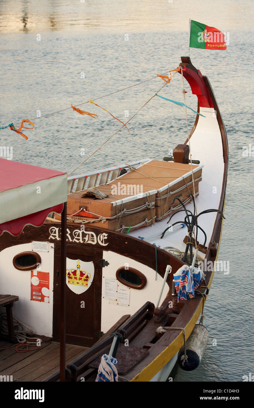 Portugal flag in the background of water attached to the bow of the boat. Portimao, Algarve, PORTUGAL Stock Photo