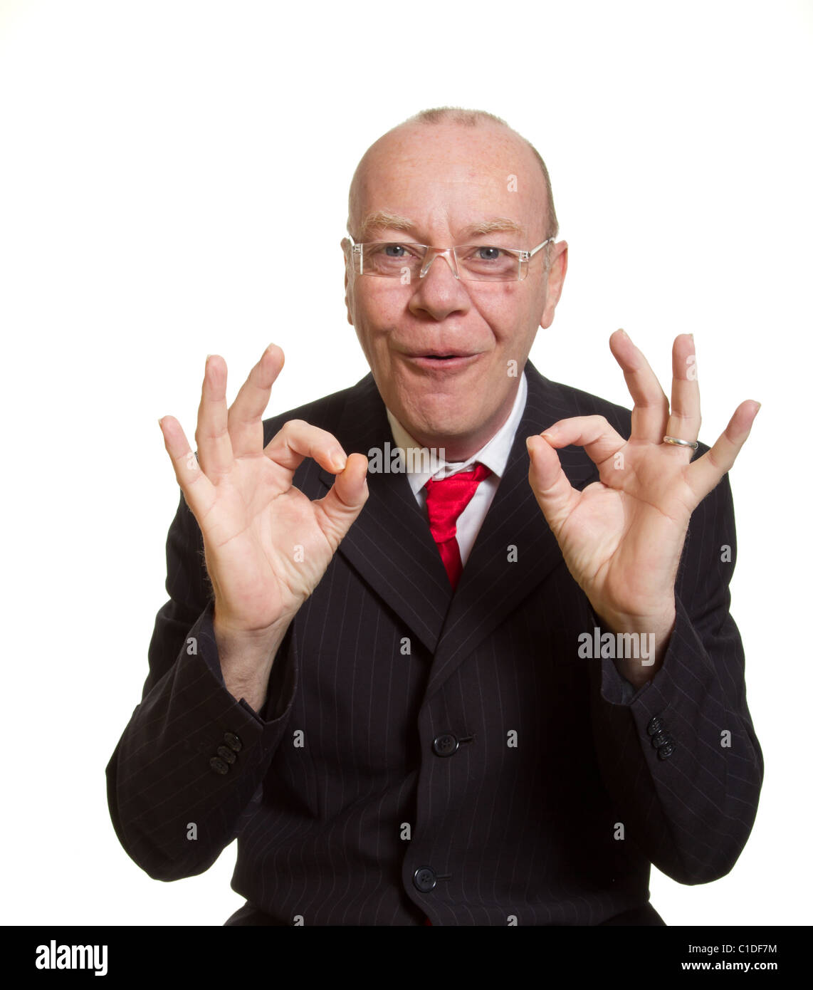 Expressive senior businessman isolated on white perfect or OK concept Stock Photo