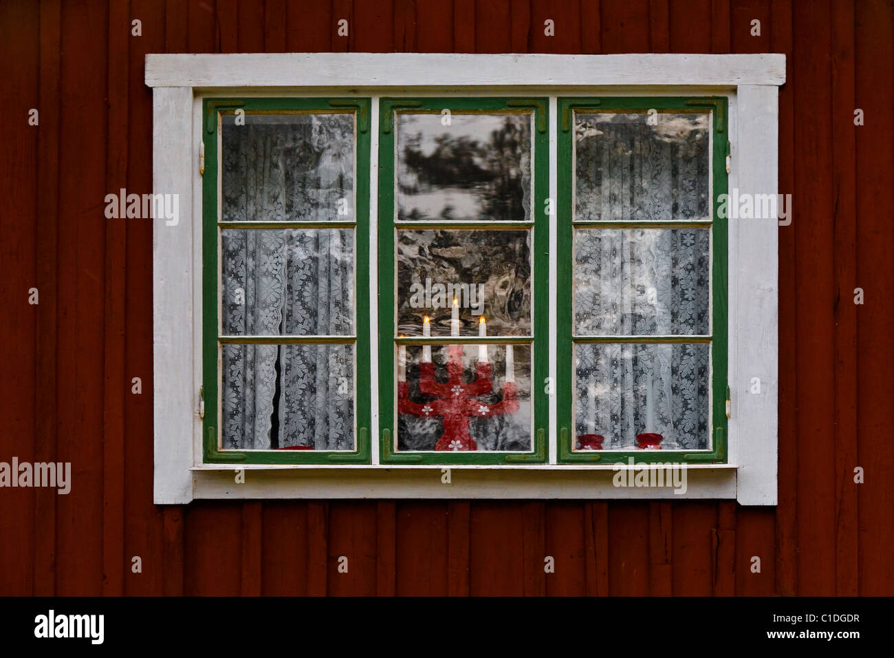 Lace curtains and advent candlestick in window Stock Photo Alamy