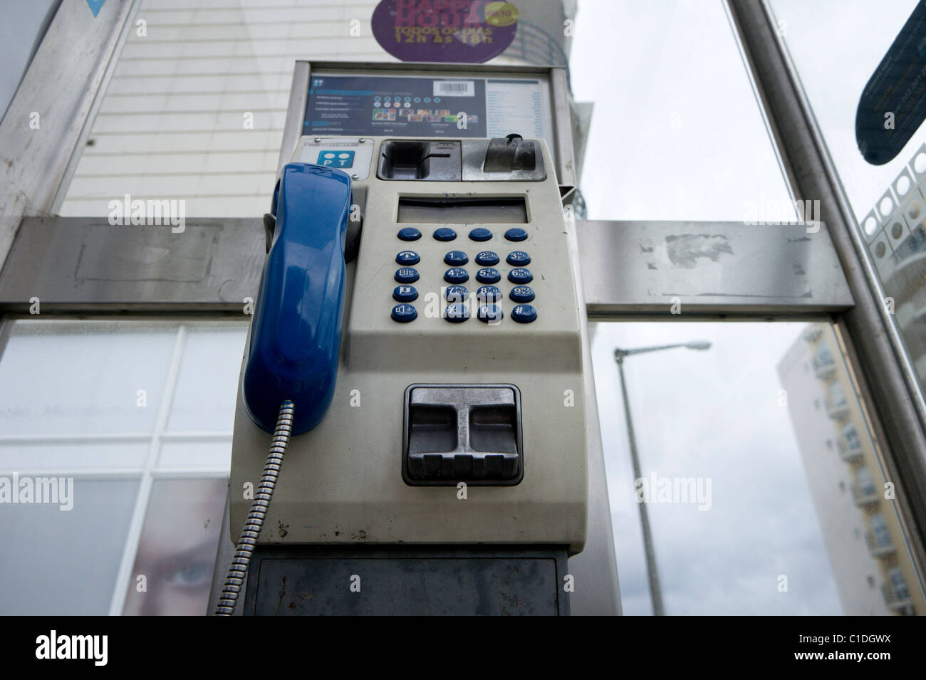 Empty public pay phone booth in Portugal Stock Photo