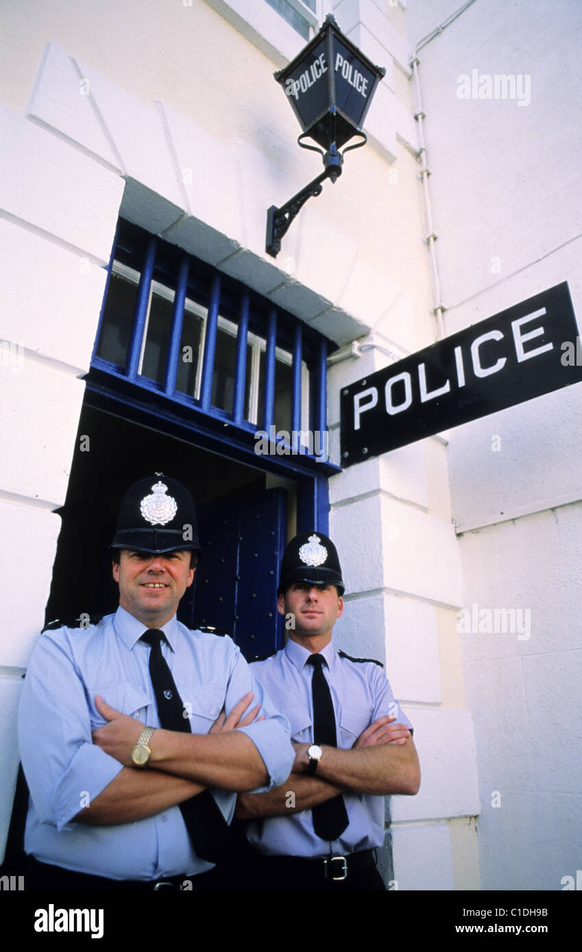 United Kingdom, Channel Islands, Alderney, Braye, Bobbies in front of the police station Stock Photo
