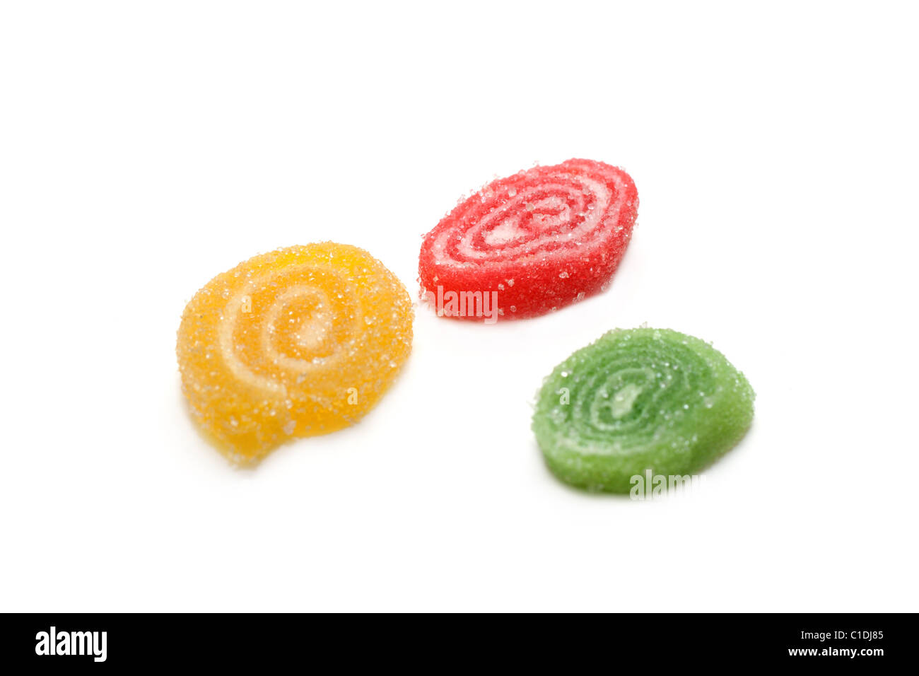 Colour fruit jellies in sugar on white background Stock Photo Alamy