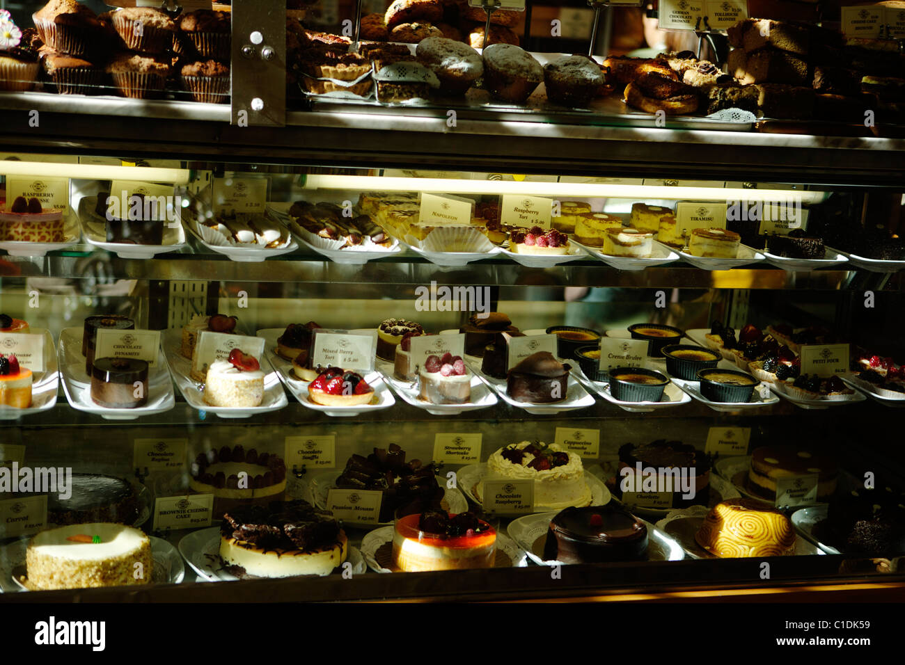 Desserts, Sweets and Pastry on display for sale Stock Photo Alamy