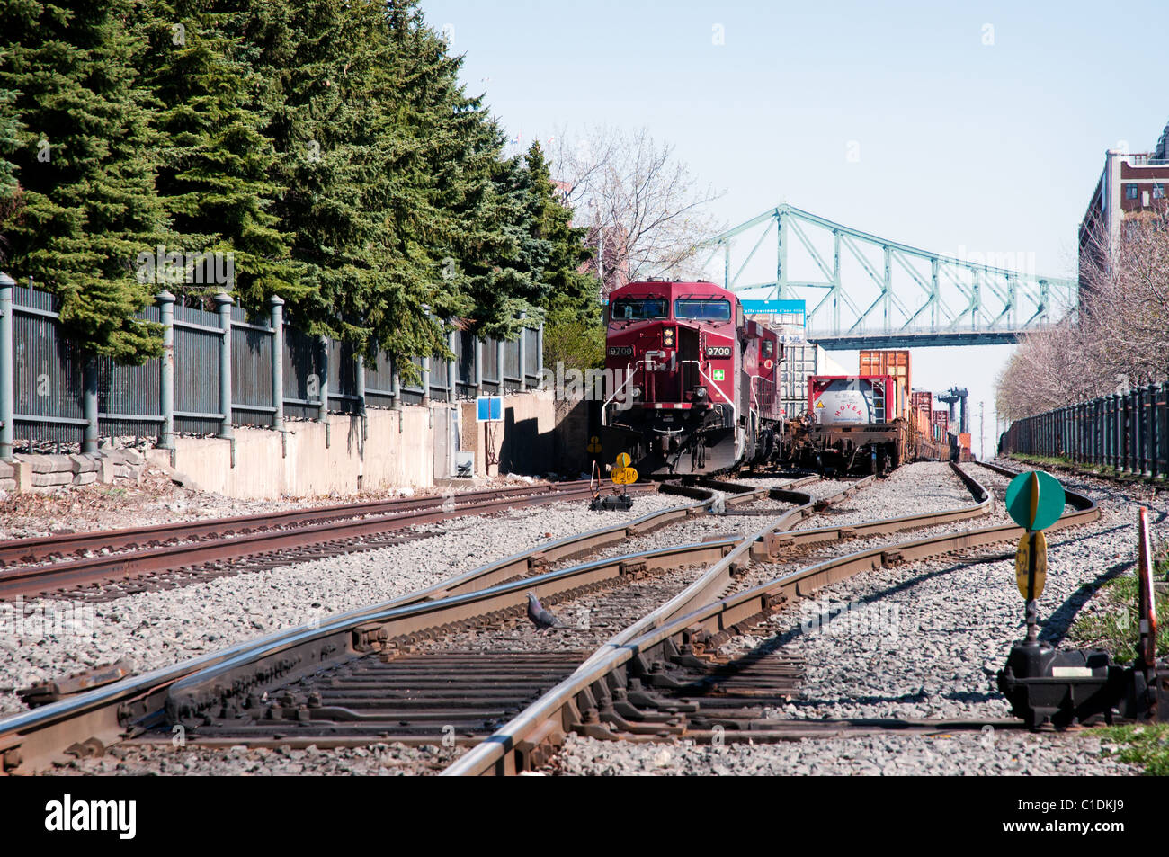 Train track along the shores of the St-Lawrence River in Old Montreal (Quebec, Canada). Stock Photo