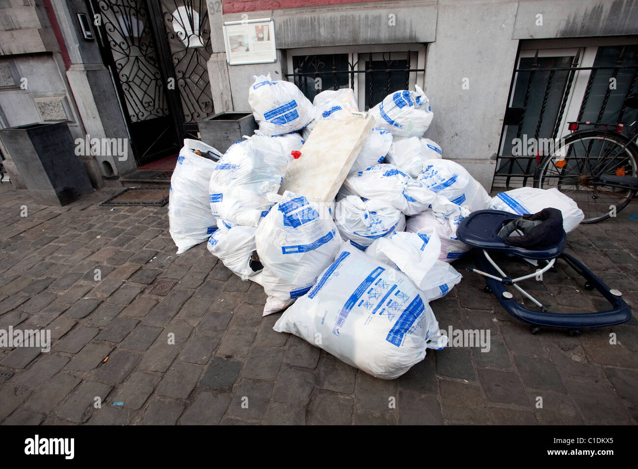Bags of trash outside a house in Brussels Stock Photo Alamy