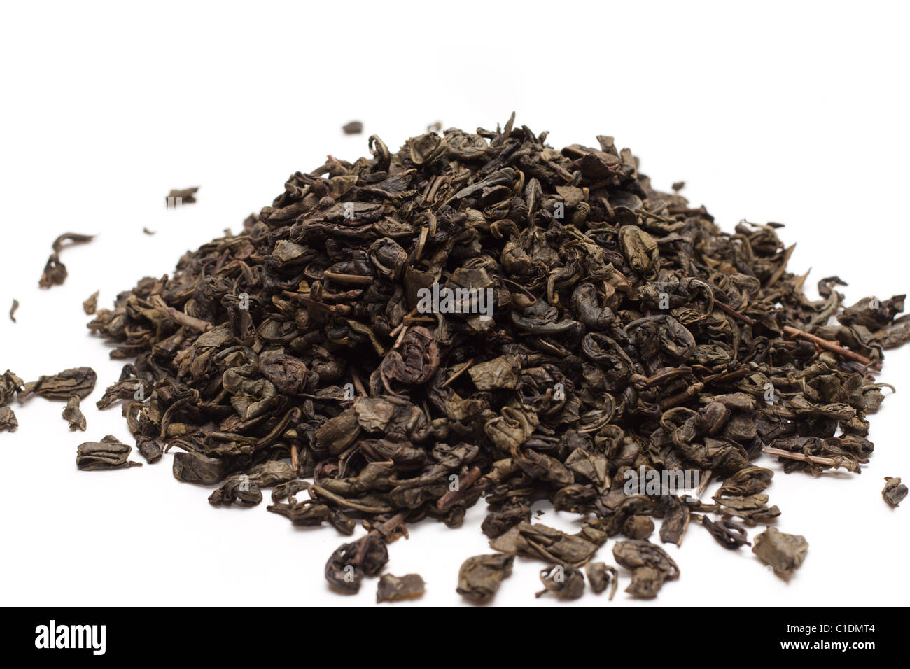 Green tea, dry, sheet insulated on white background Stock Photo