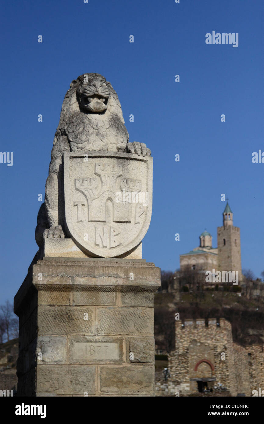 Bulgarian Lion and coat of arms with the Fortress of Veliko Tarnovo in background Stock Photo
