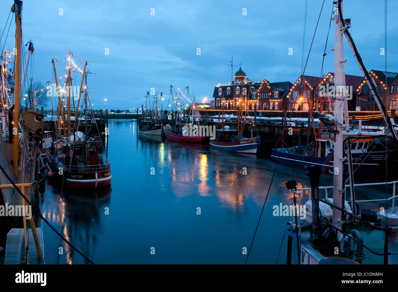 shrimp cutters in the harbour of Neuharlingersiel, North Sea, eveningview, Krabbenkutter Stock Photo