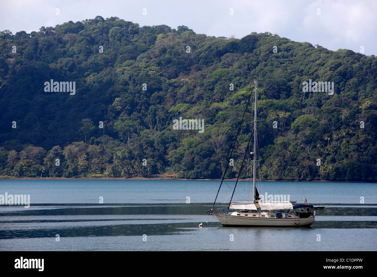 A cruising yacht anchored in Golfito Bay, Costa Rica Stock Photo