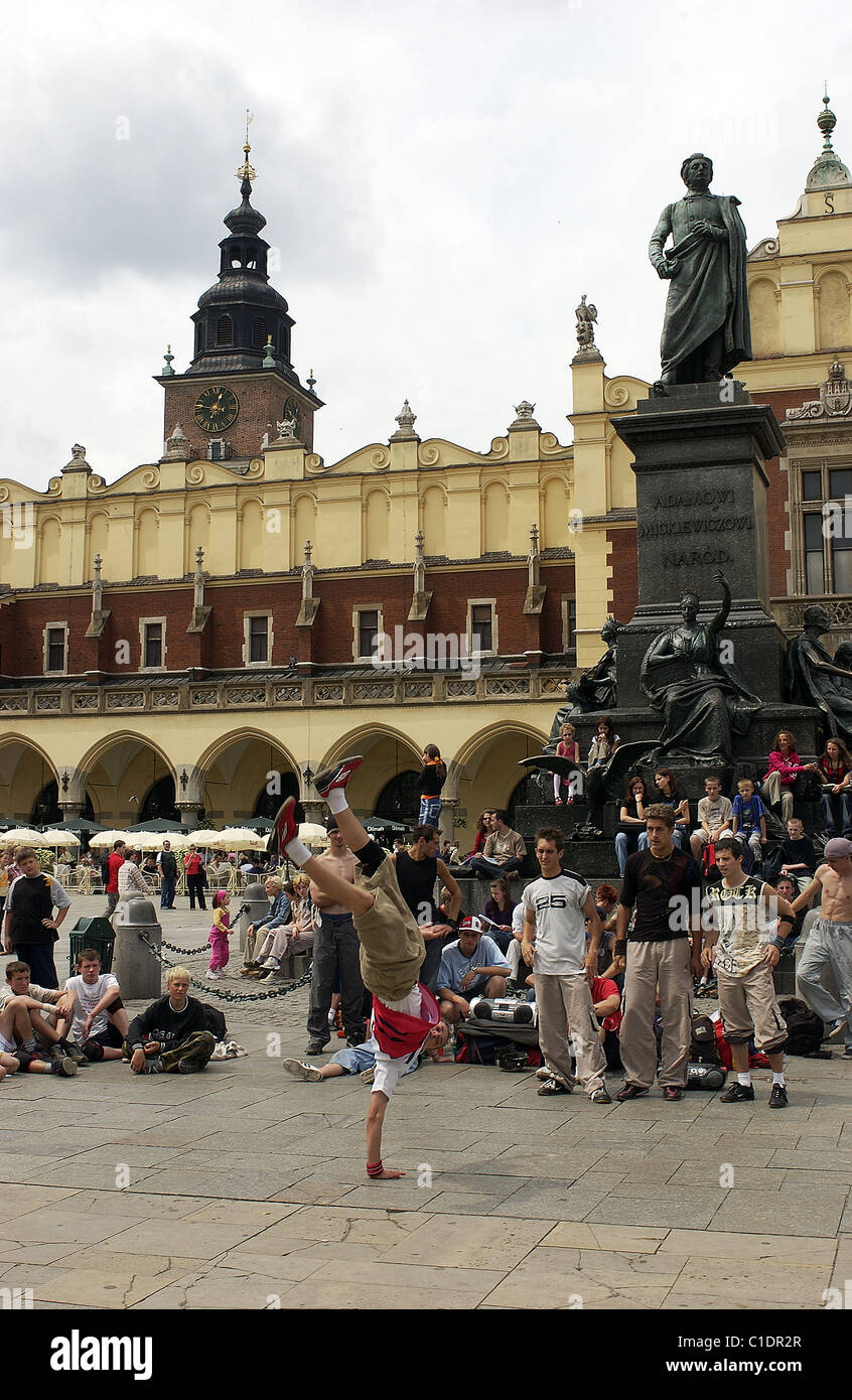Poland Lesser Poland region Krakow old town (Stare Miasto) young people dancing Hip Hop in front of the Cloths Market on the Stock Photo
