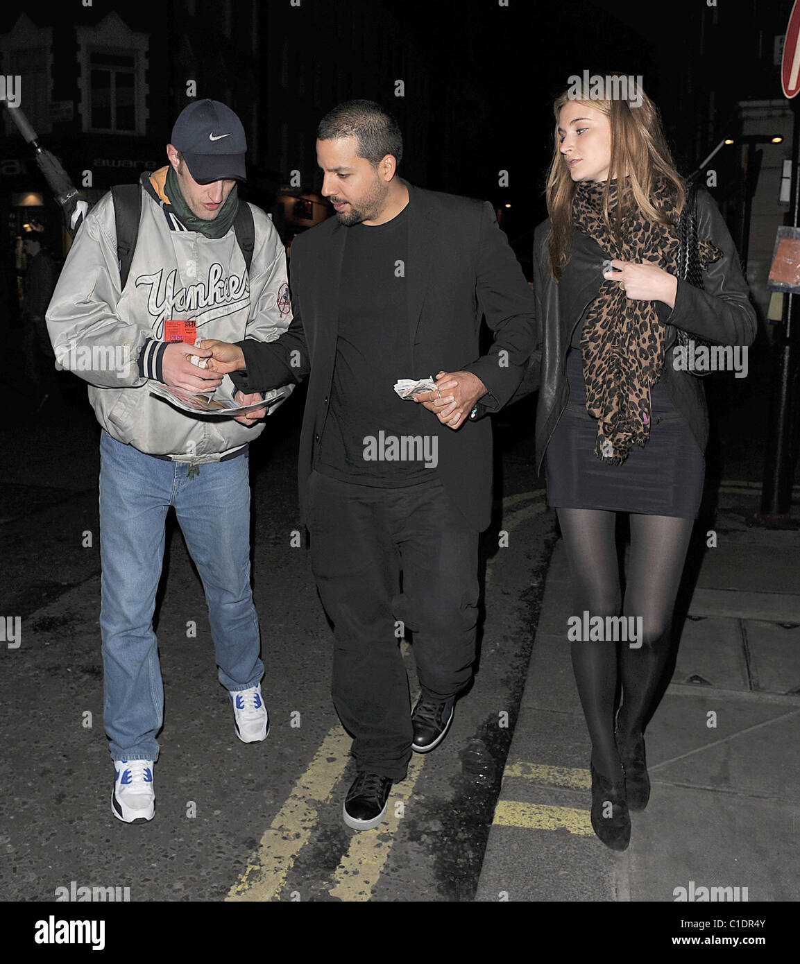 American magician David Blaine walking through Soho with his girlfriend