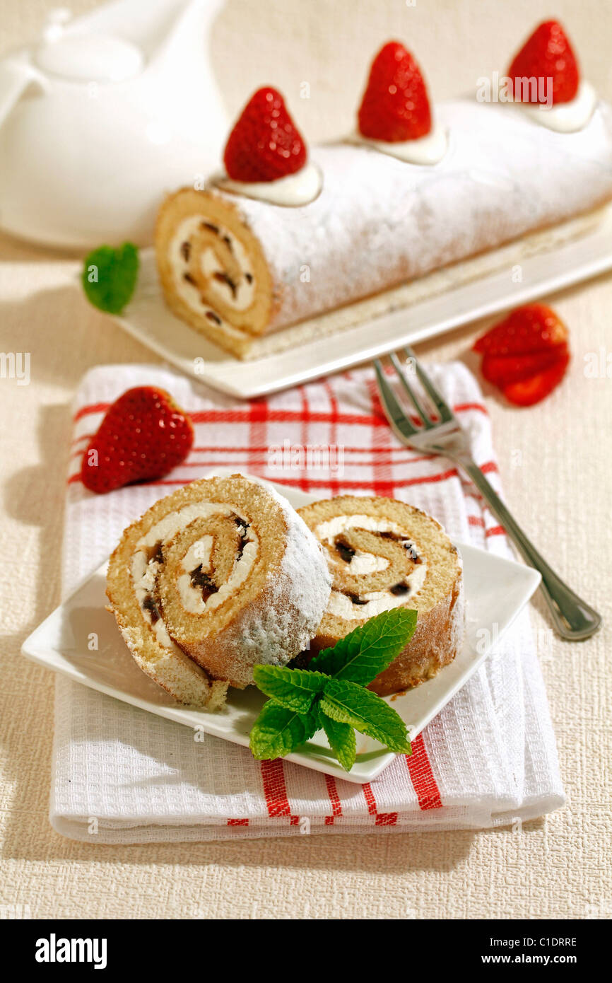 Meringue filled Swiss roll with strawberries. Recipe available. Stock Photo
