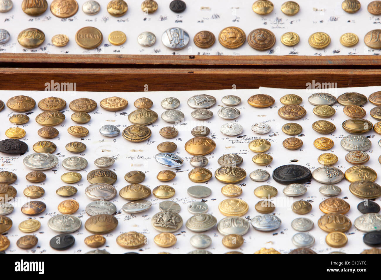 A collection of railway uniform buttons at a railway enthusiasts sale in Loughborough, Leicestershire, UK. Stock Photo