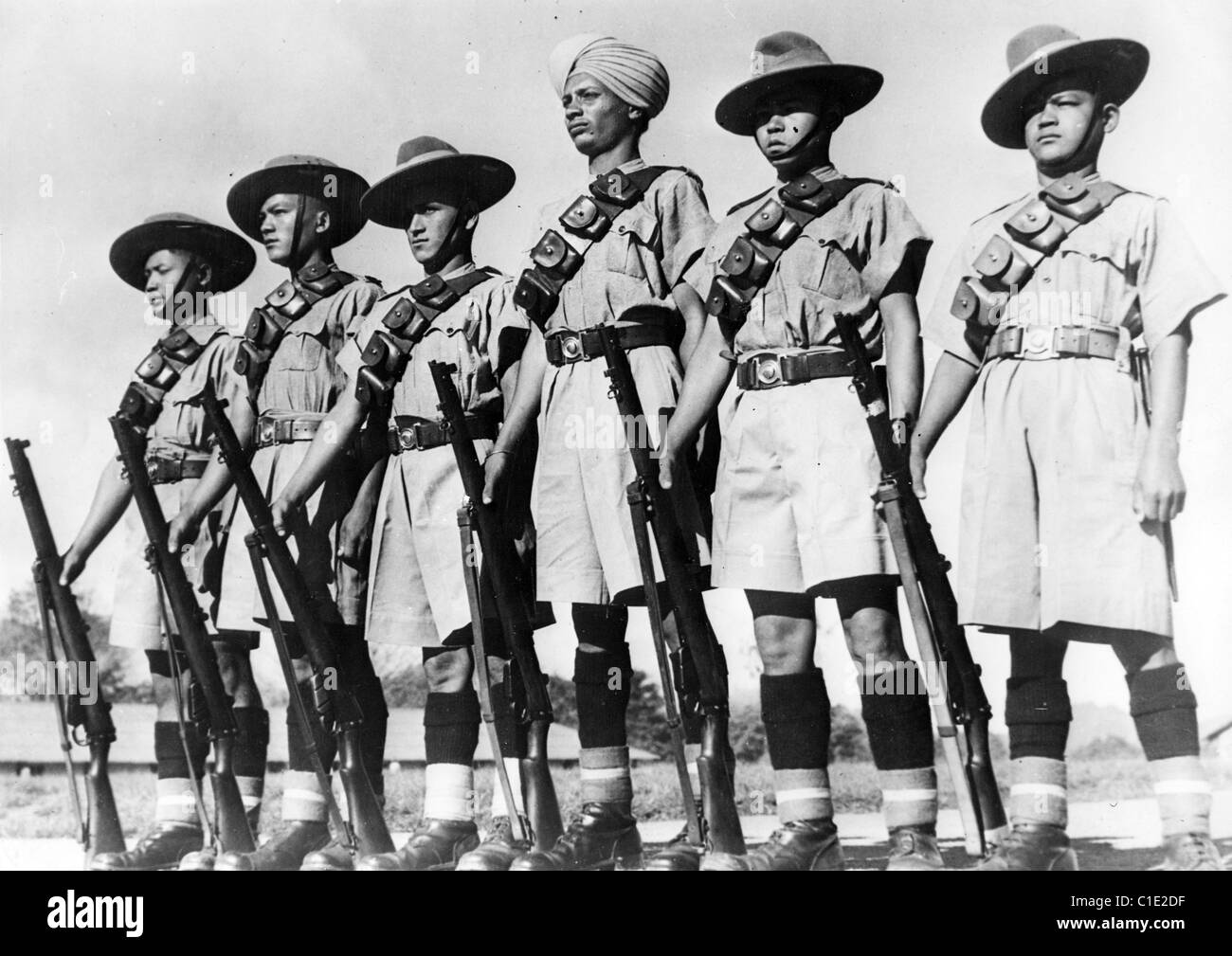 BURMESE ARMY fighting under British command in 1940  combined many native troops from India and Burma. See Description below Stock Photo