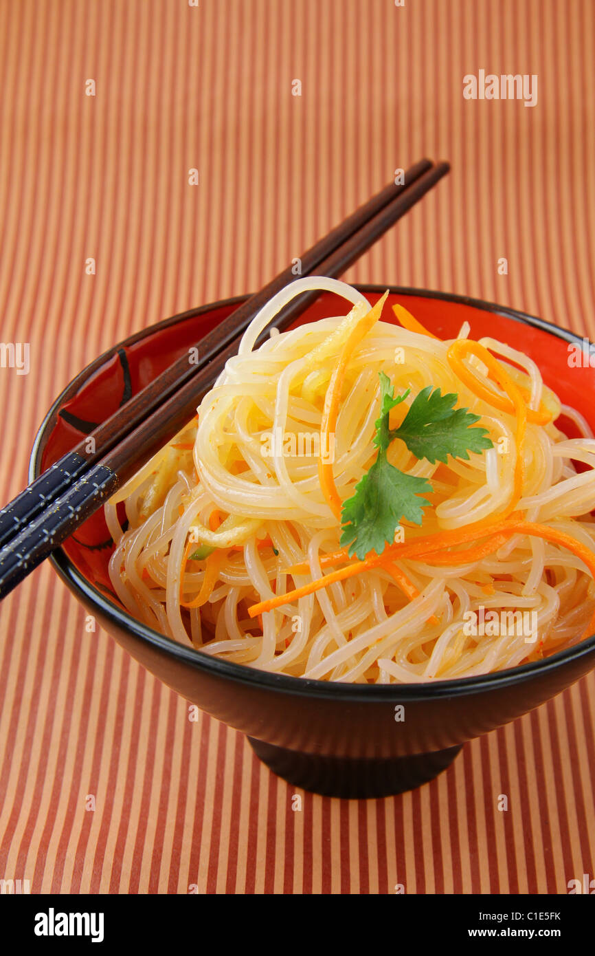 asian stir fry with vegetables and rice noodles Stock Photo - Alamy