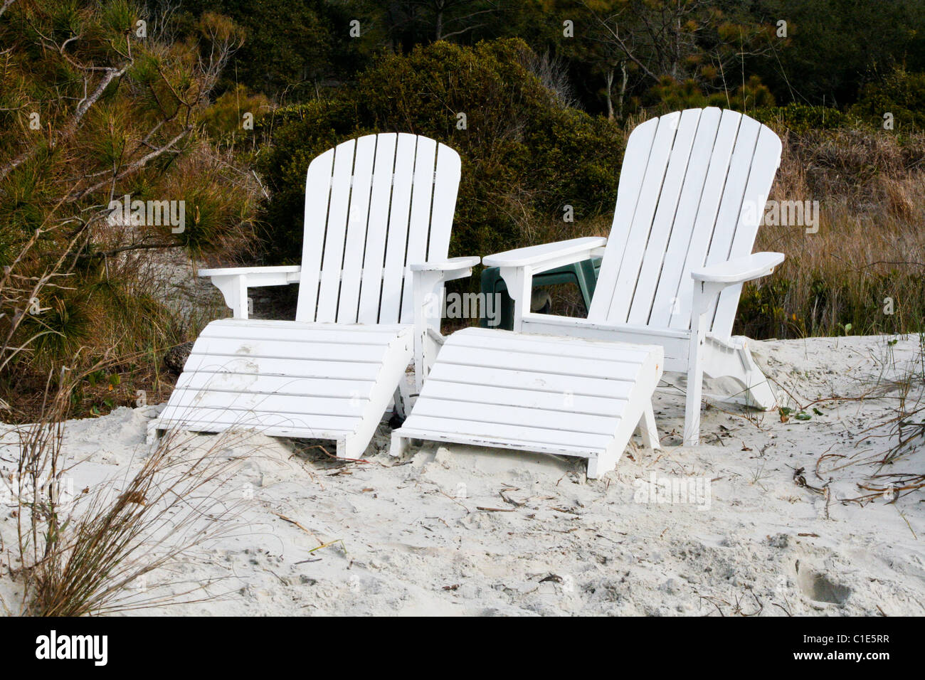 Two White Adirondack chairs in the sand Stock Photo Alamy