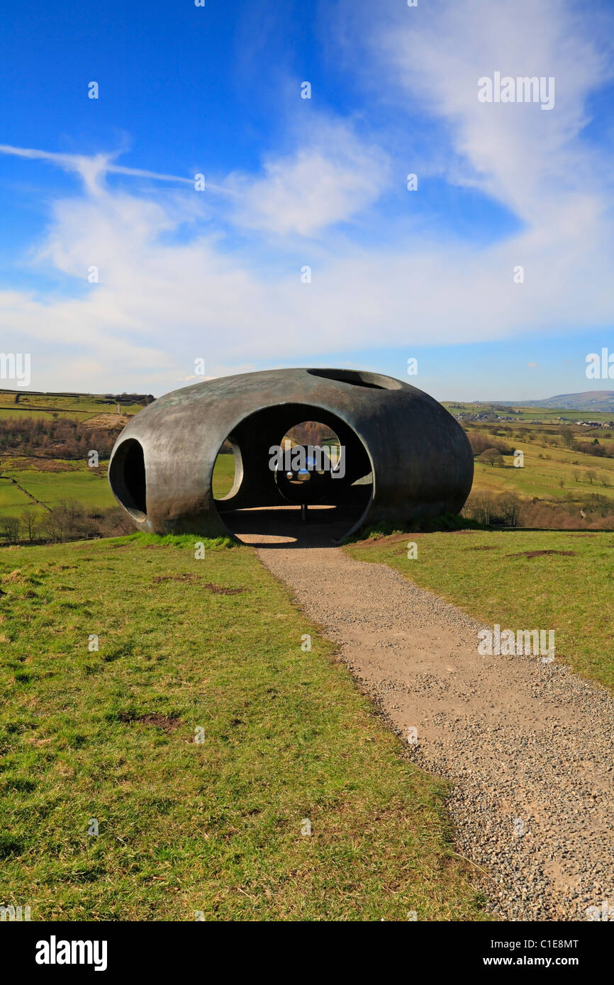 Atom Panopticon sculpture with Pendle Hill in the distance, Wycoller Country Park, Colne, Pendle, Lancashire, England, UK. Stock Photo