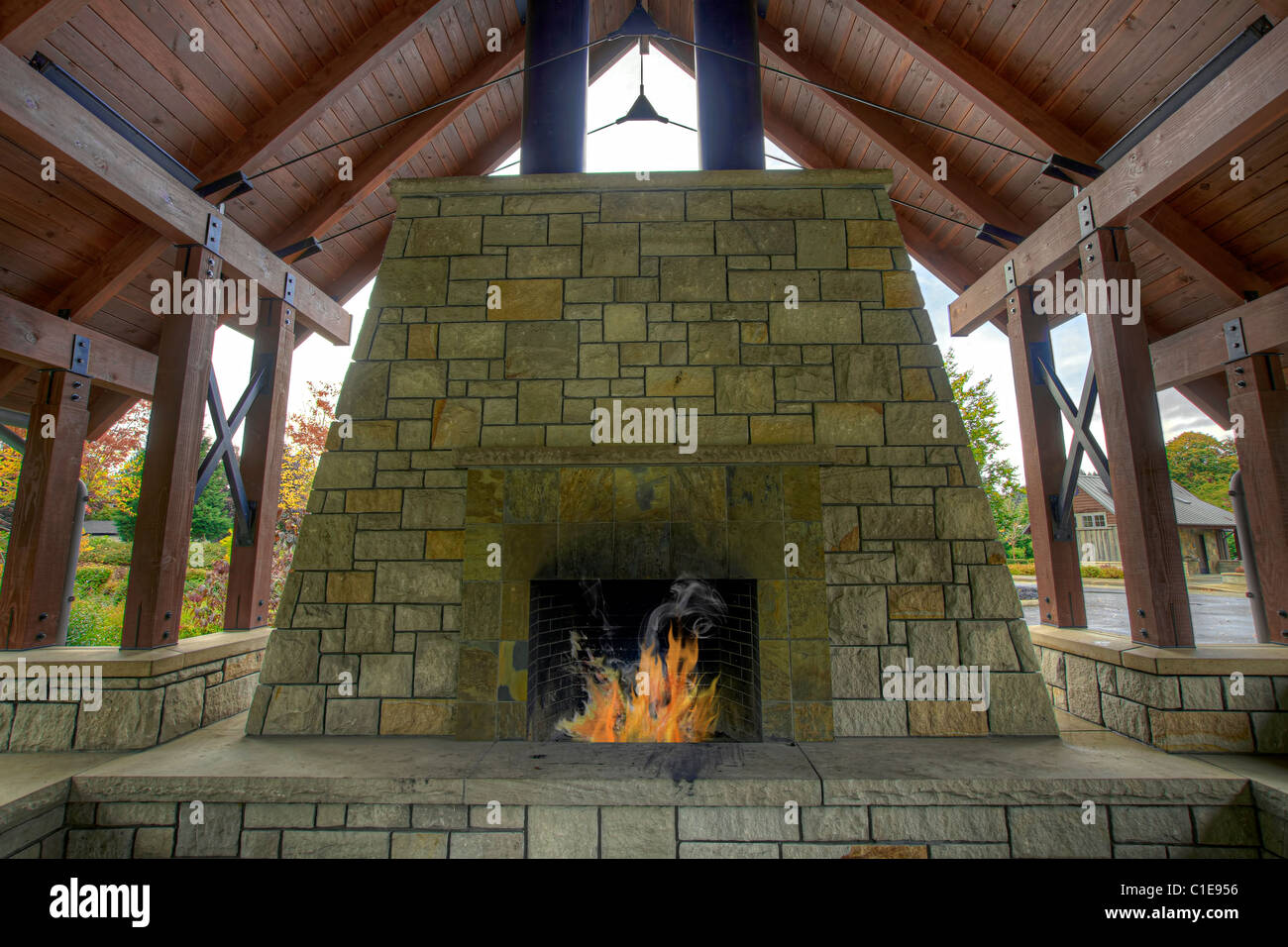 Outdoor Garden Backyard Stone Fireplace in Public Park Stock Photo