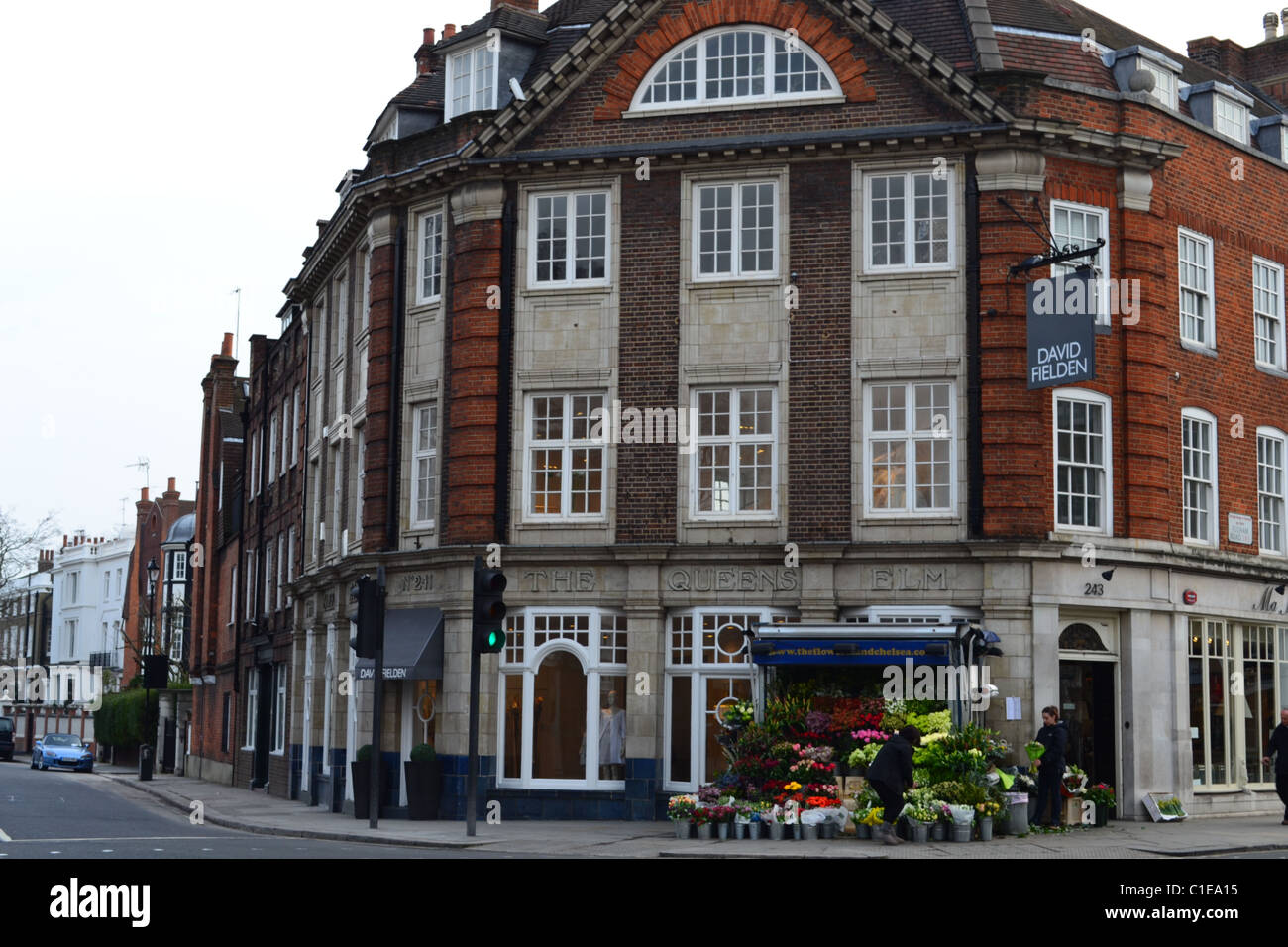 The florist's shop along the Fulham Road, Kensington & Chelsea. Beautiful red brick architecture. London, UK. ARTIFEX LUCIS Stock Photo
