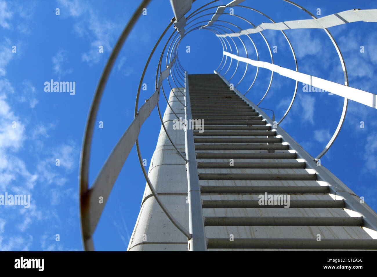 Industrial metal ladder, sky is the limit Stock Photo