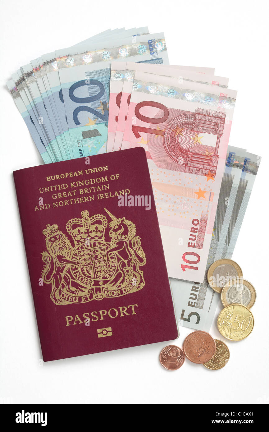 Travel Money - Euro notes and coins with British Passport Stock Photo