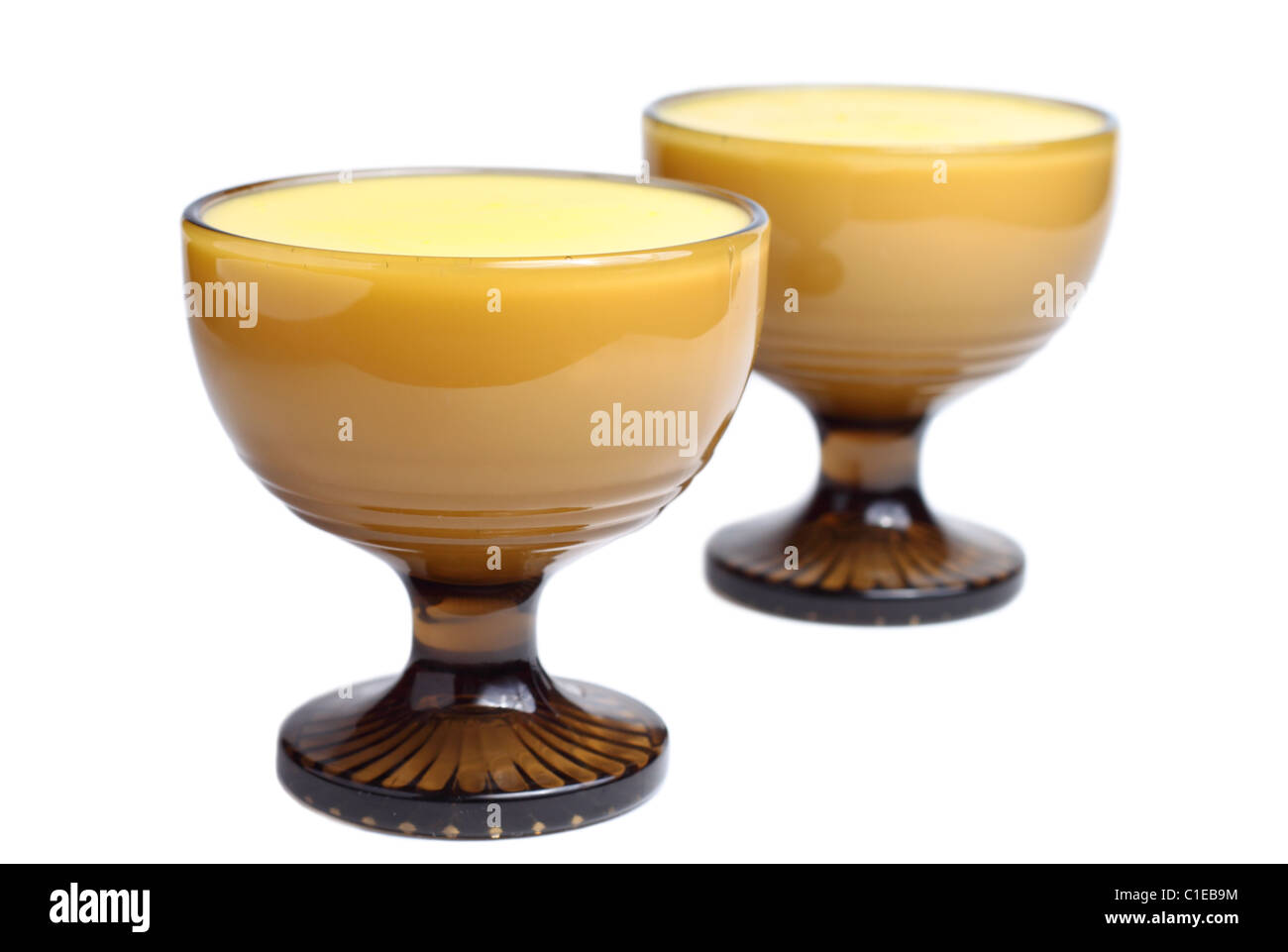Two glass bowls of vanilla-flavored pudding Stock Photo