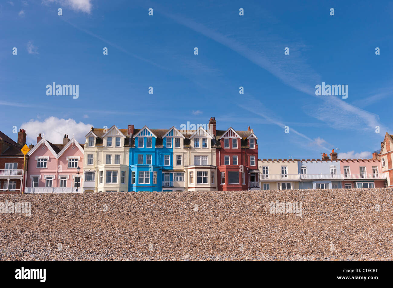 A row of colourful bay fronted houses on the seafront in Aldeburgh , Suffolk , England , Britain , Uk Stock Photo