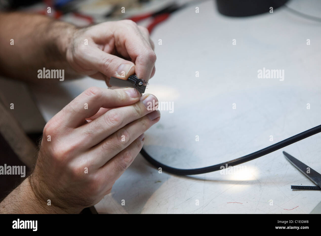 Making a guitar cable Stock Photo Alamy