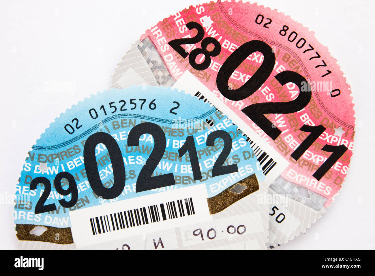 New car tax disc expiring on 29th February 2012 leap year with old expired disc. England, UK, Britain Stock Photo
