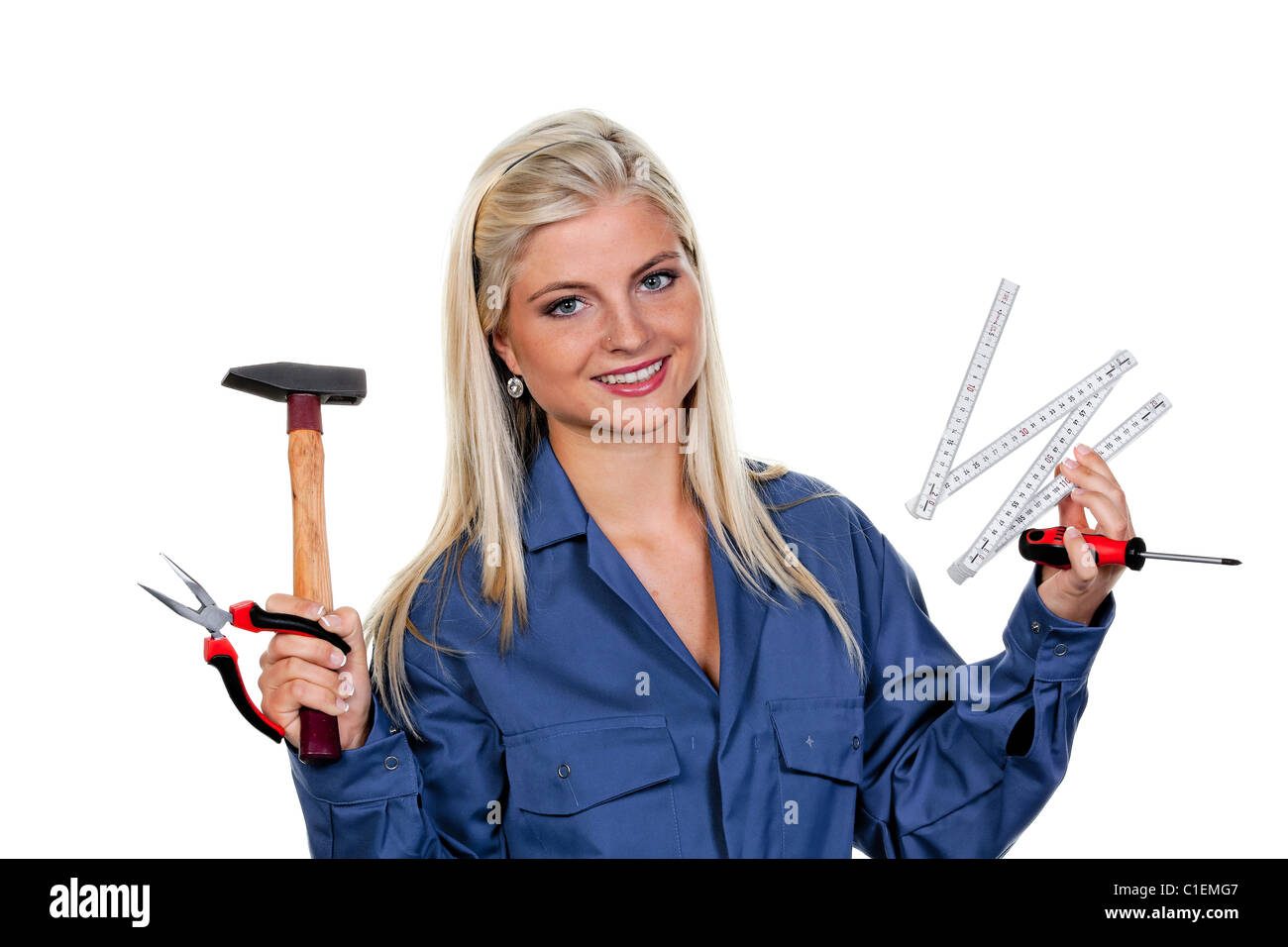 Young, pretty woman with tools as a mechanic Stock Photo