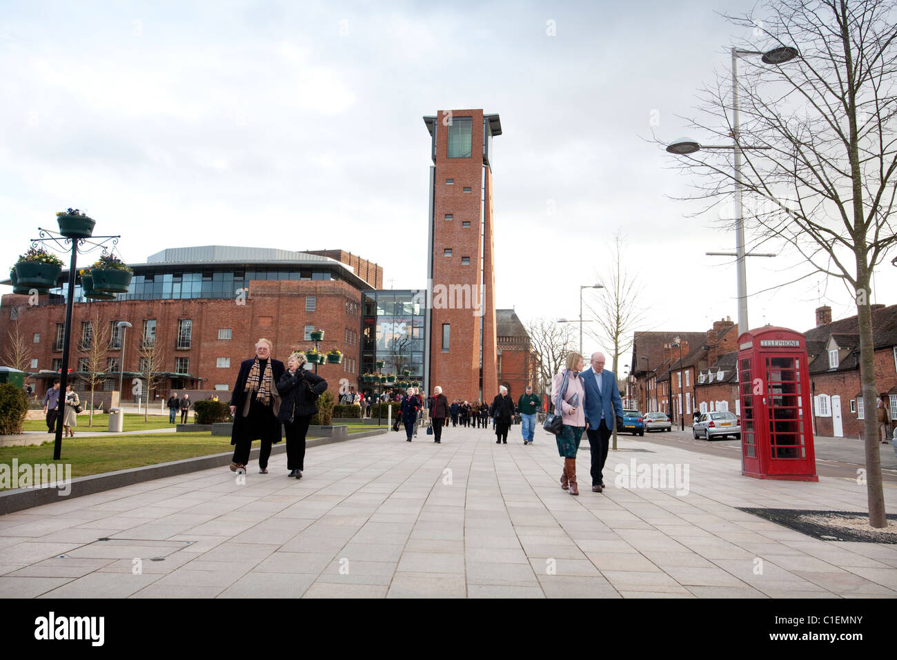 Theatre-goers leave a matinee performance at the newly re-opened Royal Shakespeare Theatre in Stratford-Upon-Avon, UK. Stock Photo