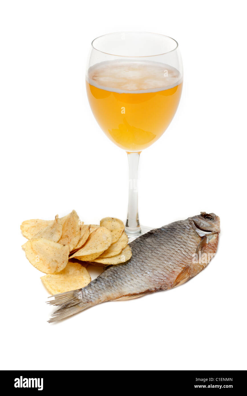 Goblet beer, dried fish and potato chips on white background Stock Photo