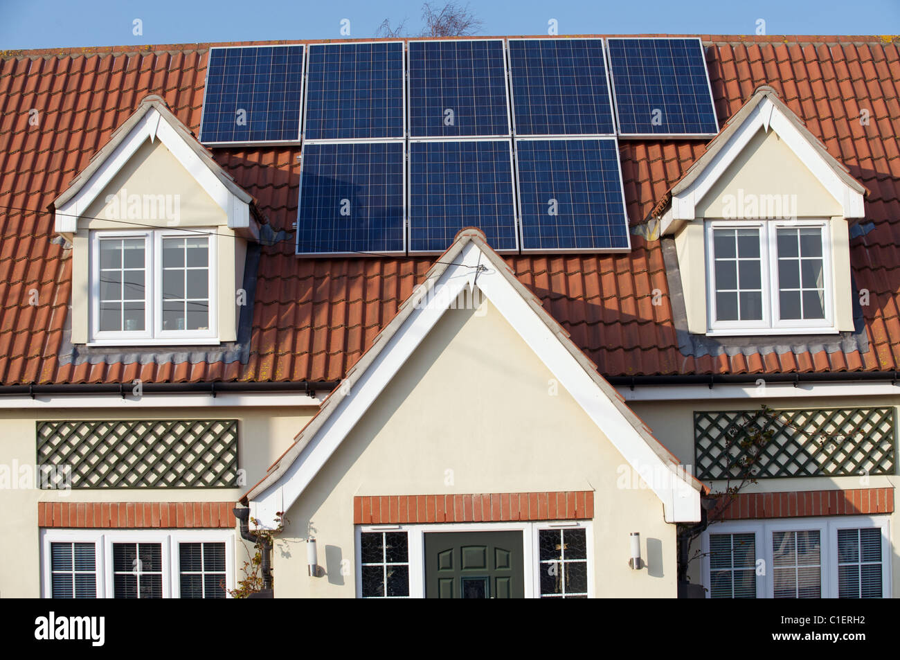 View of Residential property fitted with solar energy panels Stock Photo - Alamy