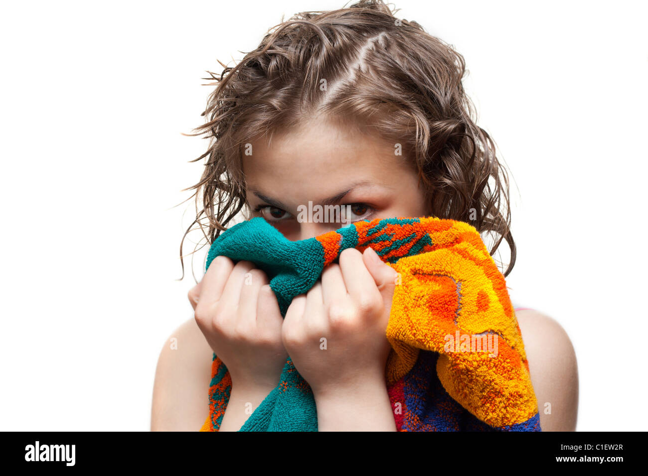 Making look younger girl with wet hair looks from for towel on white