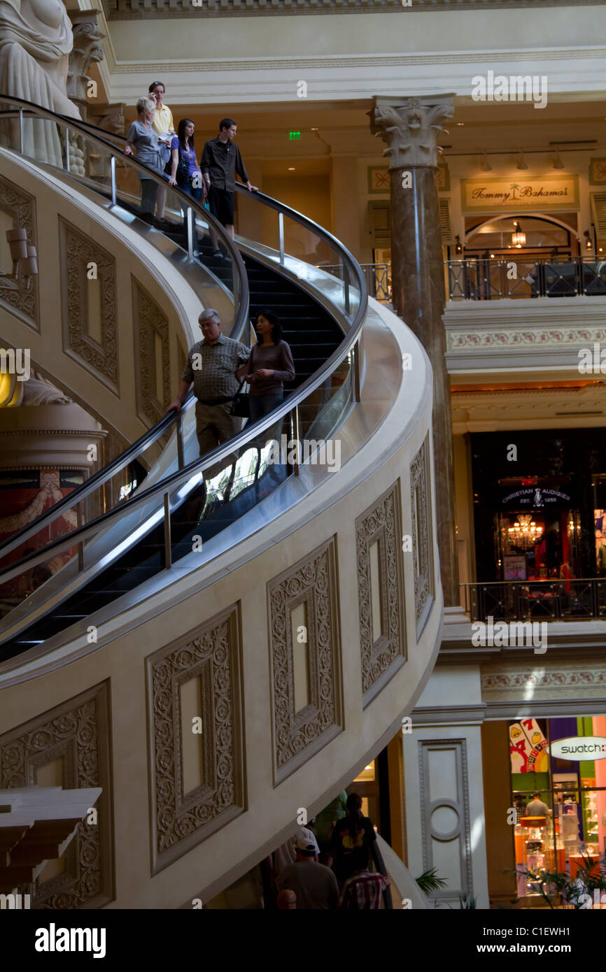 Caesar's Palace Las Vegas shopping mall entrance with spiral people carrier  stair and statues Stock Photo - Alamy