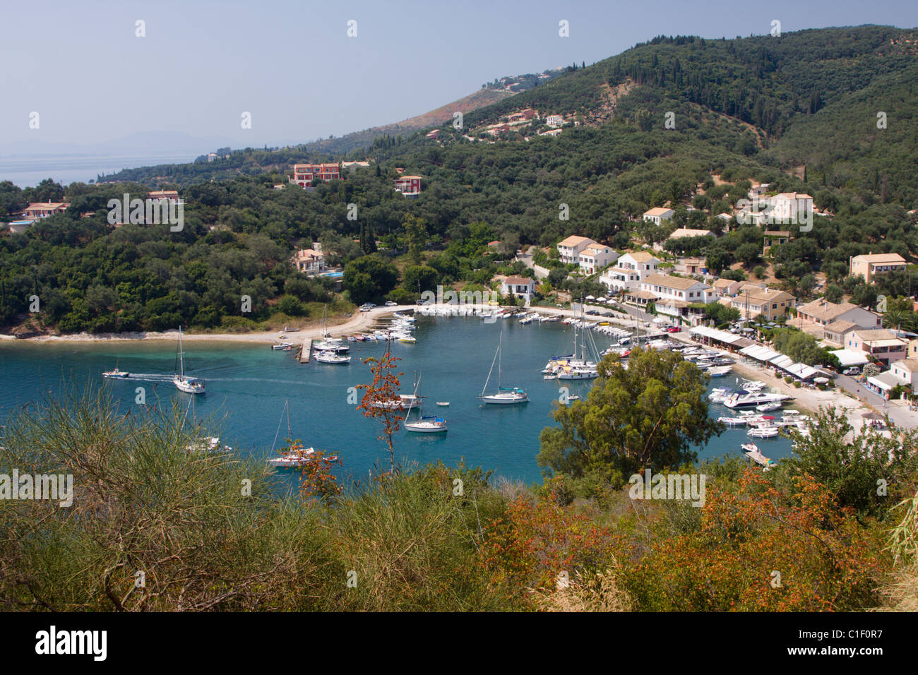 The harbour at Agios Stefanos AKA San Stefanos in the North East of Corfu Stock Photo