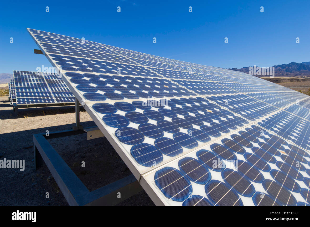 Solar panels solar array of solar panels in a solar photovoltaic (PV) energy system at Furnace Creek resort Death Valley National Park California usa Stock Photo