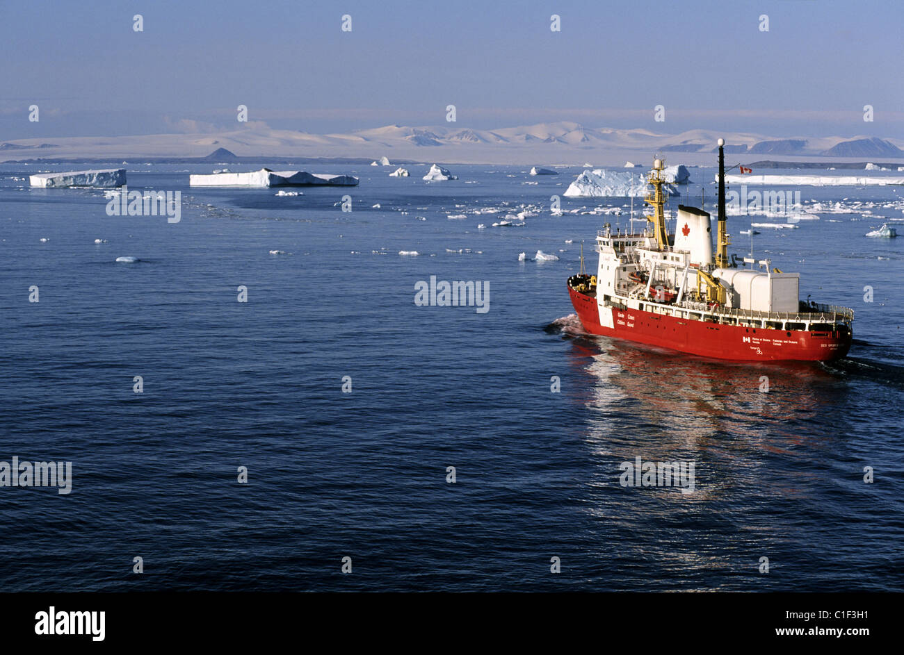 Canada Nunavut Des Groseilliers canadian coast guard icebreaker progression through the icebergs of Lancaster Sound off Devon Stock Photo