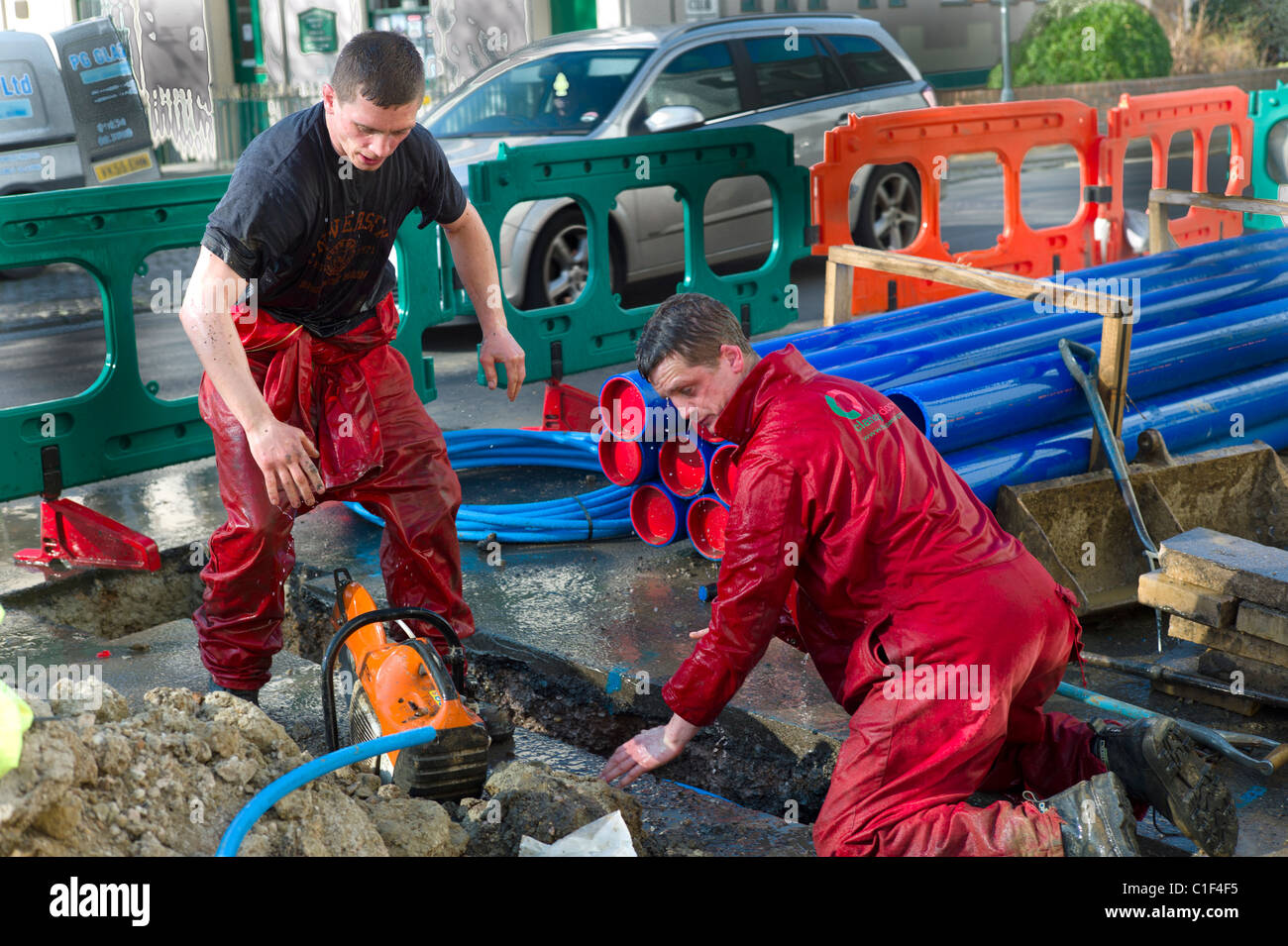 Workmen Repairing a Burst Water Main Stock Photo - Alamy