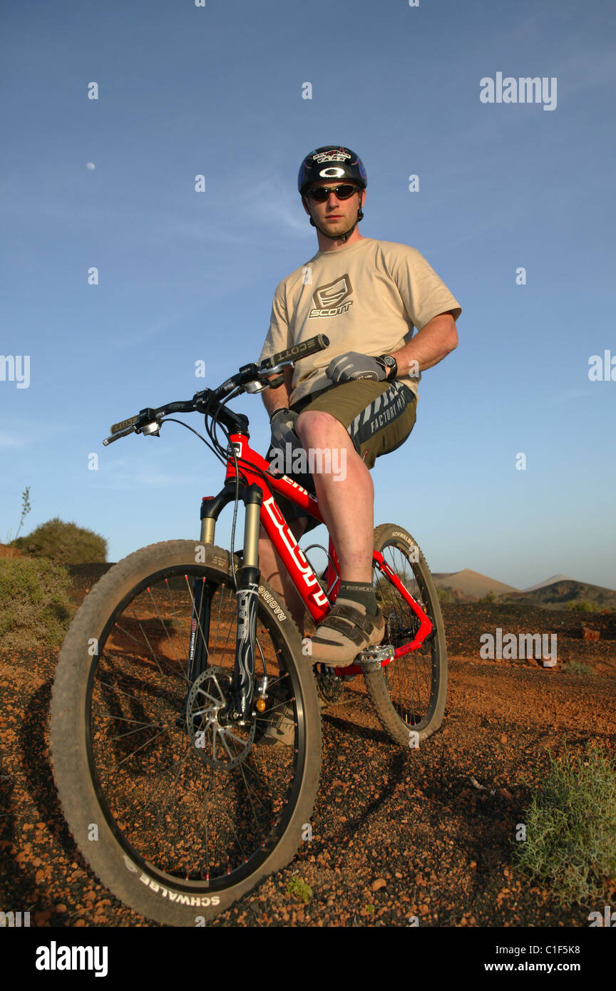 A Man sitting on his Mountain Bike Stock Photo - Alamy