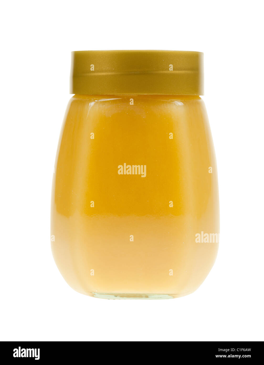 A jar of honey isolated on a white background Stock Photo Alamy