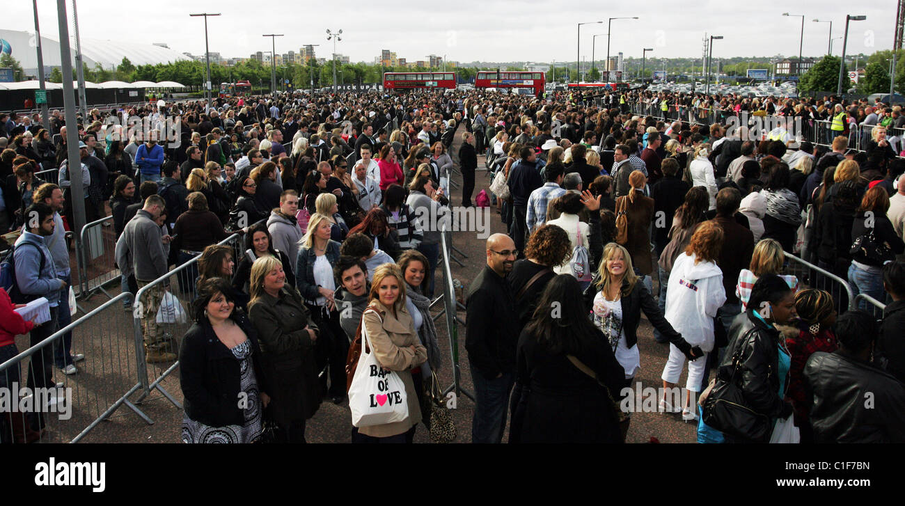 Thousands of X factor hopefuls wait in line outside the O2 Arena in ...