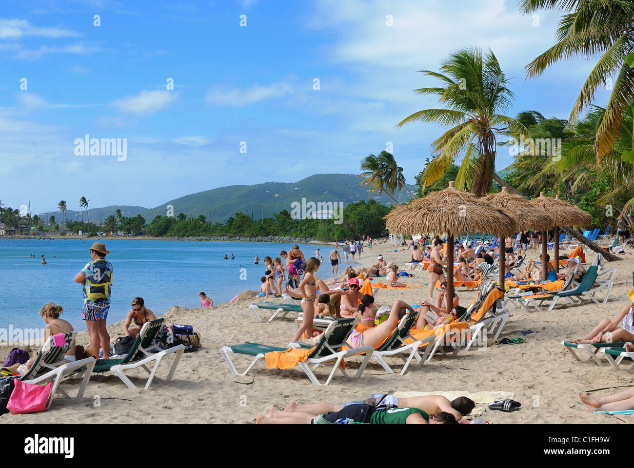 A beach with tourists on St. Thomas in the Virgin Islands. December 29, 2010. Stock Photo