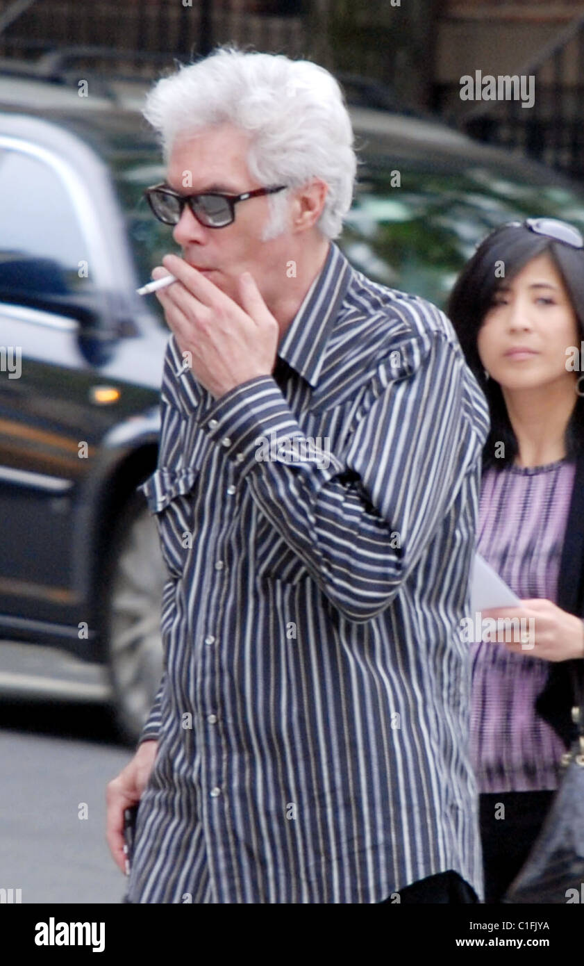 Jim Jarmusch smoking a cigarette (or weed)
