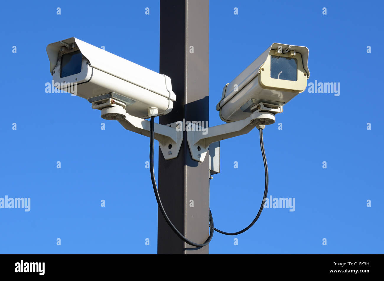 Dual security cameras on a pole Stock Photo Alamy