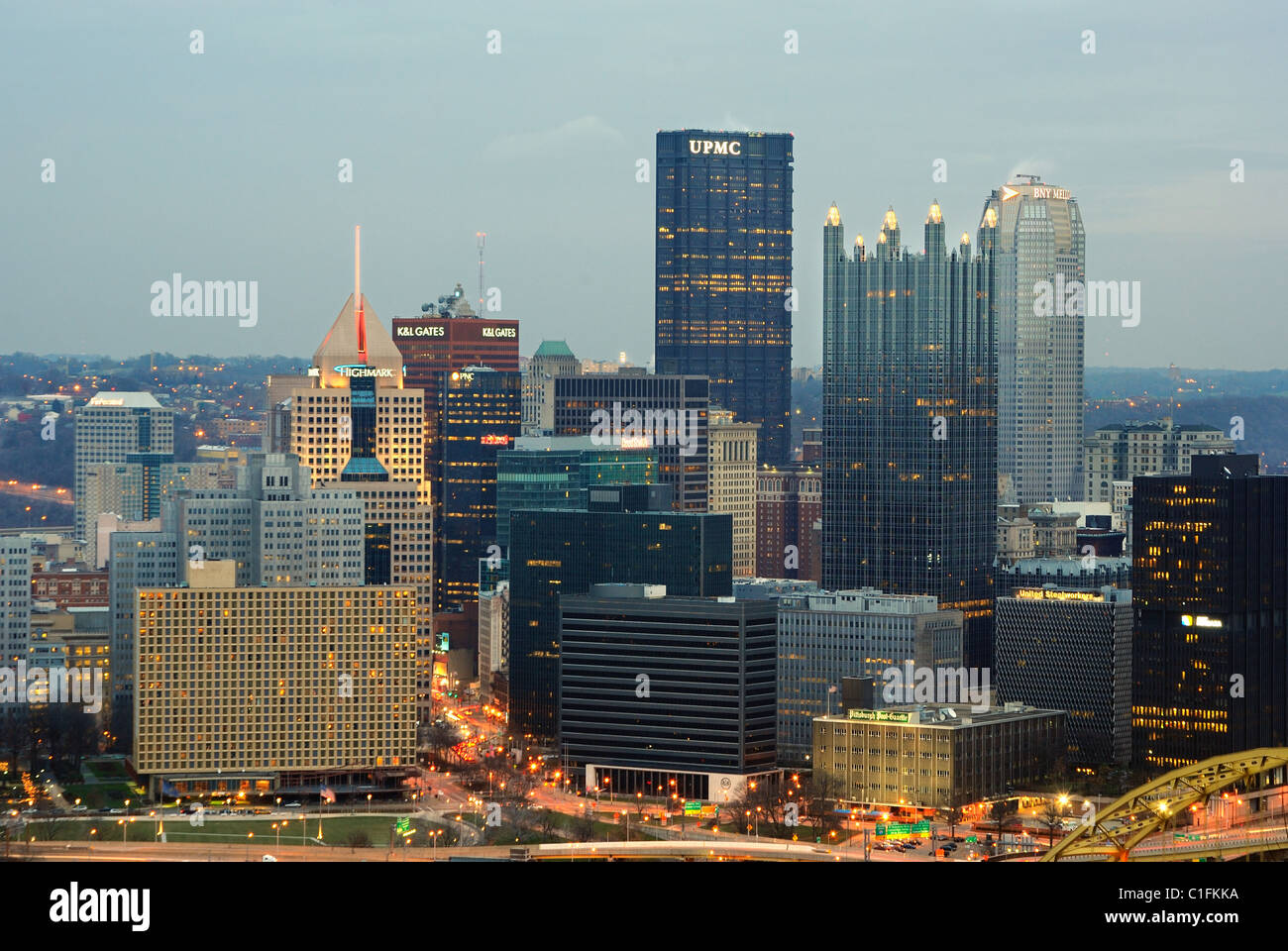 The skyline of Pittsburgh, Pennsylvania, with corporate signs visible atop skyscrapers, visible from Mt. Washington. Stock Photo