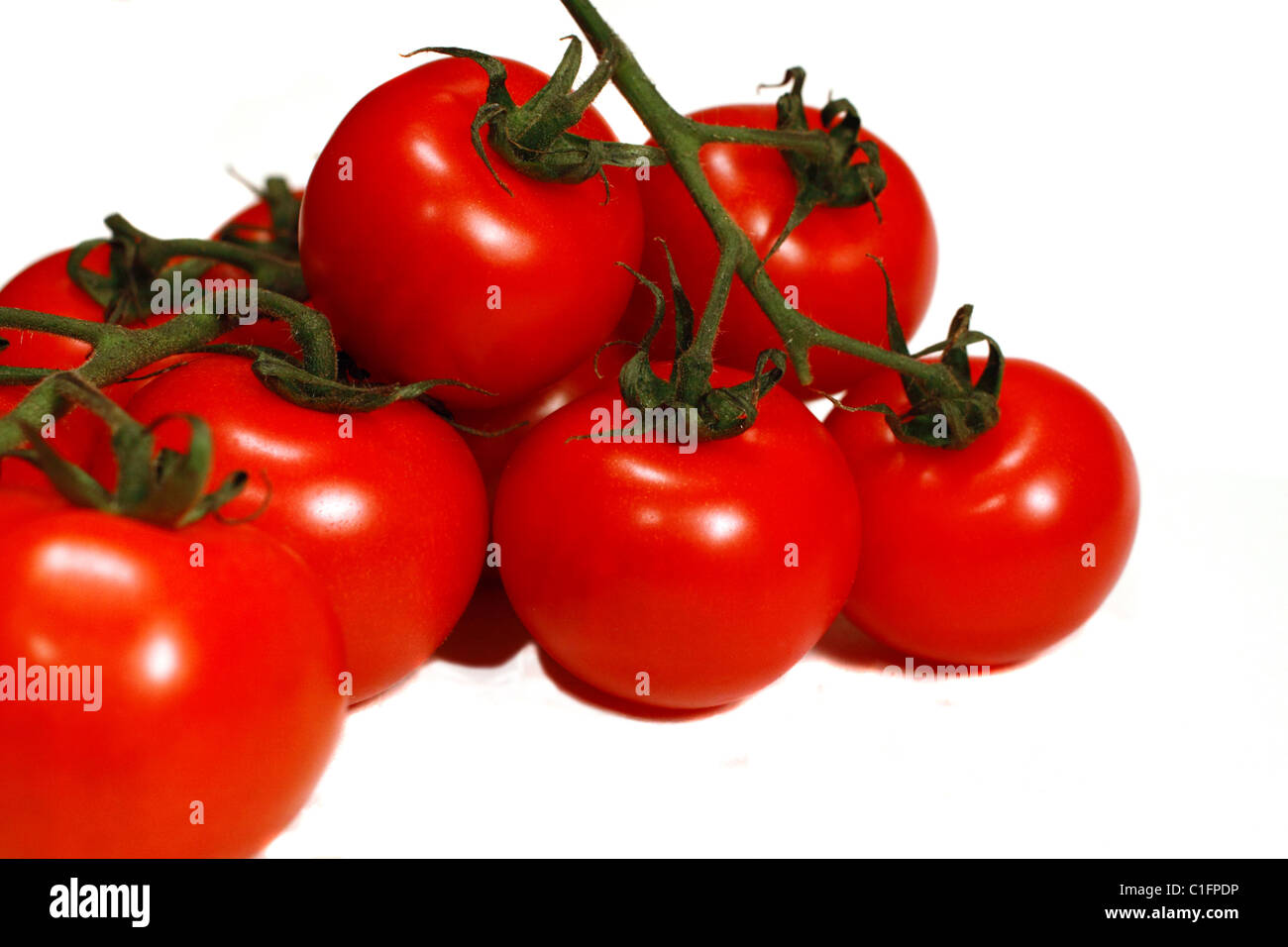 tomatoes isolated on white background Stock Photo - Alamy