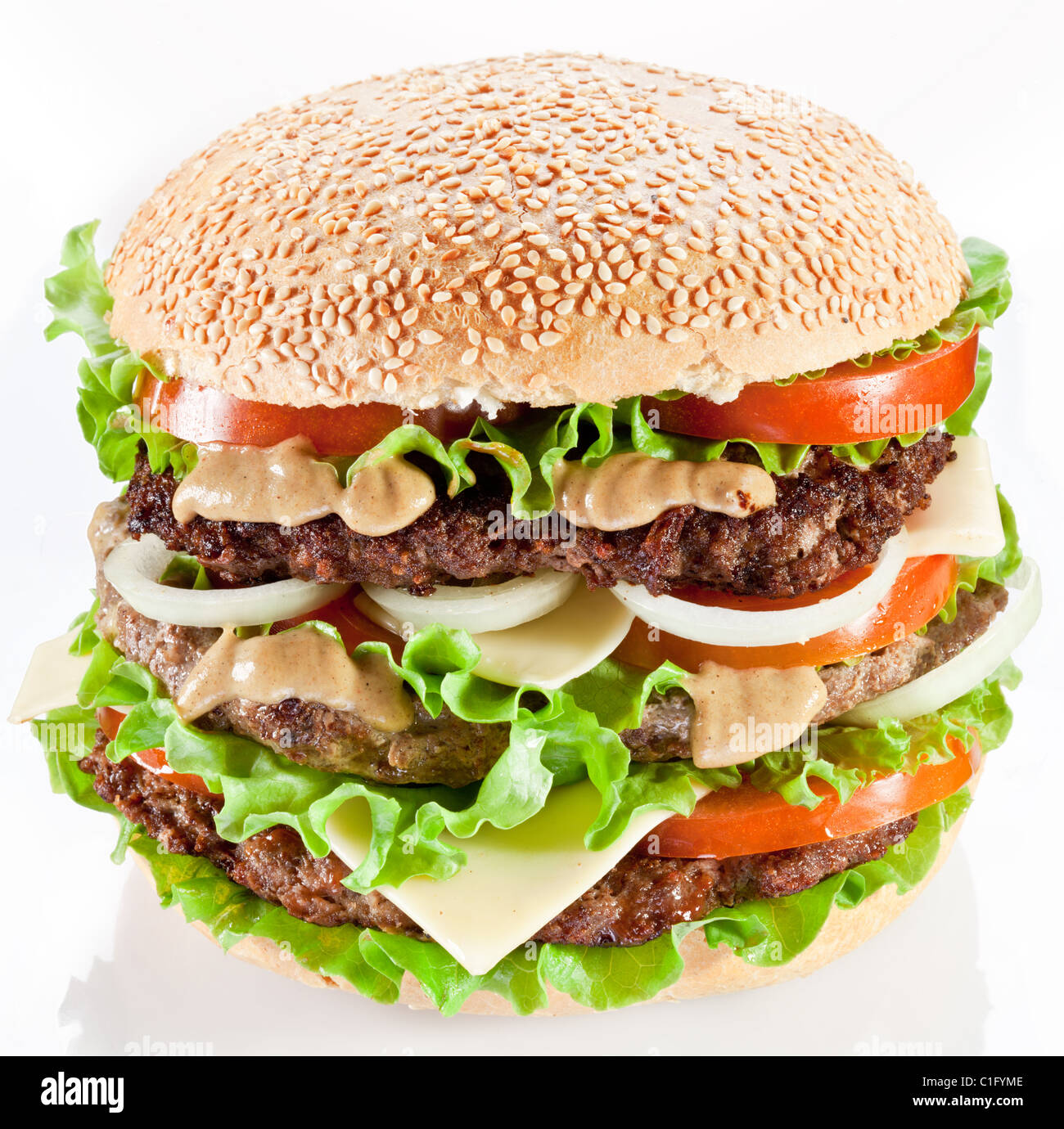 Tasty hamburger on white background. Stock Photo