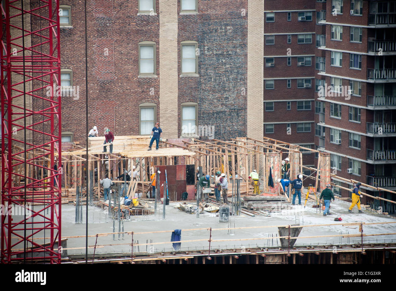 Construction workers building an affordable housing apartment building in the Chelsea